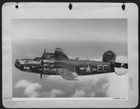 The 77 bombs painted on the fuselage of the 9th Air force Consolidated B-24 Liberator bomber "Flying Crusader", based in England, are the proud boast of a 5 man ground crew, who have weaned and nursed their precious plane since it started - Page 1