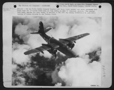 Douglas > ENGLAND-9th Air force Bomber Command Douglas A-20 Havoc light bombers now carry increased bomb loads with two 500-pound bombs hung on wing racks, as seen in this picture. The regular bomb load, besides the wing bombs, is carried in the bomb bay