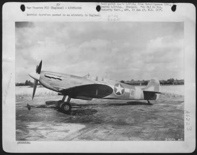 Thumbnail for British > British Spitfire parked on an airstrip in England.