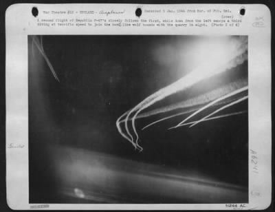 Thumbnail for Vapor Trails > A second flight of Republic P-47's closely ofllows the first, while down from the left swoops a third diving at terrific speed to join the hunt like wolf hounds with the quarry in sight.