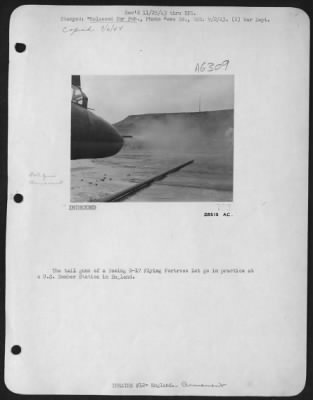 Thumbnail for General > The tail guns of a Boeing B-17 Flying ofrtress let go in practice at a U.S. Bomber Station in England.