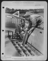 Thumbnail for Extreme caution must be exercised in loading the .50 caliber gun of a Republic P-47 Thunderbolt fighter. As it may mean the life of the pilot or another victory. These men are experts as you can see by the number of Jerries shot down by the pilot - Page 1