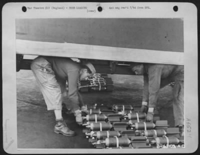 General > Bombs are being loaded in a Boeing B-17 Flying ofrtress to help the invasion army penetrate Hitler's ofrtress on the Second Front. The trailer carries the entire load of 100-pounders, the ofrtress "Chug-A-Lug IV" will drop, in one of the day's
