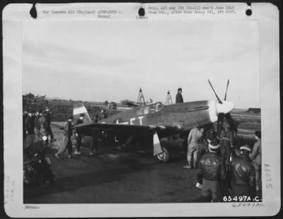 Thumbnail for North American > Men Of The 401St Bomb Group Look Over A North American P-51 "Mustang" At An 8Th Air Force Base In England, 27 December 1943.