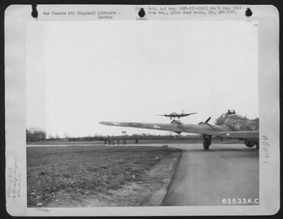 Boeing > Men Of The 401St Bomb Group Watching A Boeing B-17 "Flying Fortress" Landing At An 8Th Air Force Base In England, 26 September 1944.