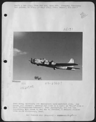 Thumbnail for Boeing > Over Enemy Territory She Encounters Anti-Aircraft Fire.  The Black Puff Directly Beneath Her Nose Is A Burst Of 'Flak' From A Nazi 'Fliegerabwehrkanone'.  This Photgraph, And The Two Following, Are Taken By Major  Wm. M. Jackson, A Medical Officer From So