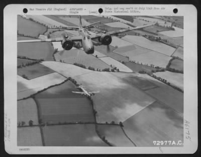 Douglas > A Douglas A-20 Of The 410Th Bomb Group Flies Over The English Countryside On A Routine Flight.  Note Boeing B-17 "Flying Fortress" Below.