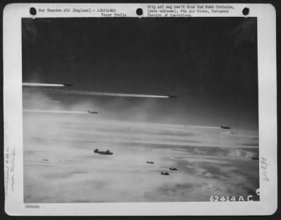 Thumbnail for Vapor Trails > Consolidated B-24 "Liberators" Of The 2Nd Bomb Division 8Th Air Force, Enroute To Bomb Nazi Installations 24 November 1944, Leave Fleecy Vapor Trails In Their Wake.