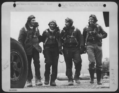 General > Republic P-47 Thunderbolt pilots of the 354th fighter-bomber group, their mission completed, head for the interrogation tent. Left to right: Capt. James D. Dalglish, 604 N. George St., Rome, N.Y.; Major Glenn T. Eagleston, 3133 Poplar Blvd.