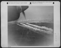 Thumbnail for Smoke screen laid to protect landing of allied troops on French Beachhead. - Page 1