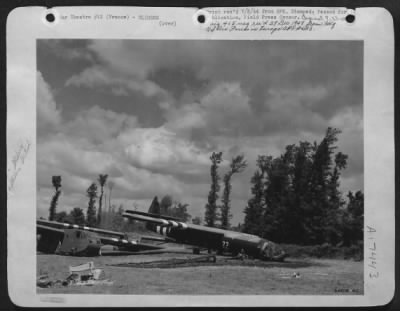 Thumbnail for General > British and American gliders lie side by side in French pastures where they landed airborne infantry on D-Day.