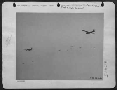 Thumbnail for General > Douglas C-47 Transports of the Troop Carrier Air Division of the Twelfth Air force are shown here towing airborne troop ladened gliders toward the Southern French Coast where they released the Gliders at a point between Toulon and Cannes.