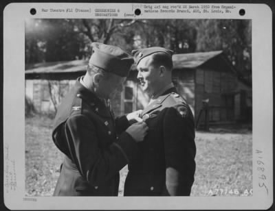 Thumbnail for Unidentified > Brig. Gen. John P. Doyle Presents An Award To A Member Of The 320Th Bomb Group During A Ceremony At An Airbase At Dijon, France.  1945.