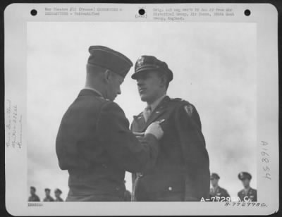 Unidentified > Major General Samuel E. Anderson Presents An Award To A Member The 386Th Bomb Group During A Ceremony At An Air Base In Beaumont, France.  15 March 1945.