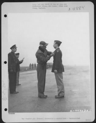 Unidentified > Major General Hoyt S. Vandenberg Presents An Award To A Member Of The 386Th Bomb Group During A Ceremony At An Air Base Somewhere In France.  23 October 1944.