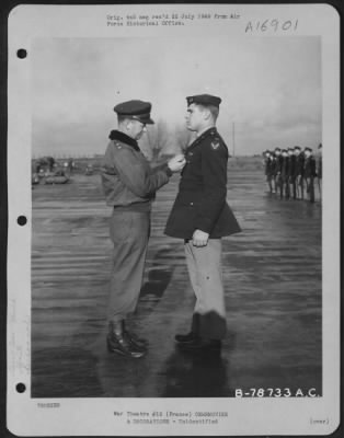 Unidentified > Major General Samuel E. Anderson Presents An Award To An Officer Of The 410Th Bomb Group During A Ceremony At An Airbase Somewhere In France.