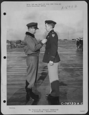 Unidentified > Major General Samuel E. Anderson Presents An Award To An Officer Of The 410Th Bomb Group During A Ceremony At An Airbase Somewhere In France.