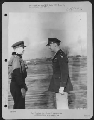 Unidentified > Major General Samuel E. Anderson Presents An Award To An Officer Of The 410Th Bomb Group During A Ceremony At An Airbase Somewhere In France.