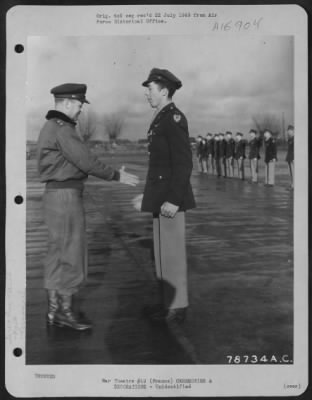 Unidentified > Major General Samuel E. Anderson Presents The Distinguished Flying Cross To An Officer Of The 410Th Bomb Group During A Ceremony At An Airbase Somewhere In France.