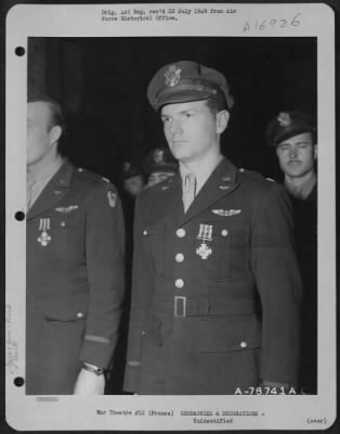 Thumbnail for Unidentified > Officers Of The 410Th Bomb Group Stand In Formation After Receiving The Distinguished Flying Cross During A Ceremony At An Airbase Somewhere In France.