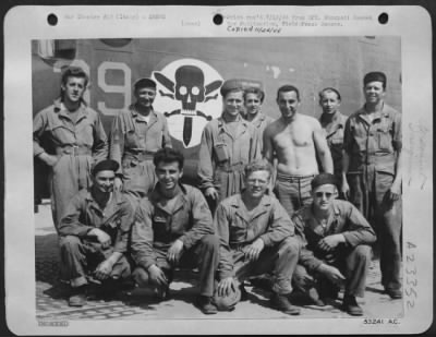 Thumbnail for Consolidated > ELEVEN MEN AND A BOMBER---Here are the repairmen of a XV Air Service Command field unit who called a Consolidated B-24 Liberator bomber their "home." In 12 days they had made two engine changes, complete installation of supercharger and propellers