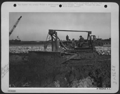 Thumbnail for Consolidated > After a few days of operating in the mud, even this huge bulldozer was bogged down. This is life for aviation engineers at airfields in Italy.