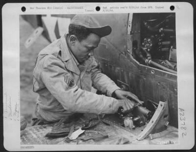 Thumbnail for Consolidated > THOSE P-39 AIRACOBRAS-being used by a Negro fighter group operating with the Mediterranean Allied Air Forces msut be kept in good condition mechanically. That's where S/Sgt. James McGee, of Marianna, Ark., comes in for his offering. He has served