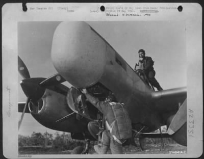 Thumbnail for Consolidated > Italy - Mickey Operator Of Lockheed P-38 'Droopsnoot' Literally Crawls Into The Aps-15, Components Of Which Surround Him.