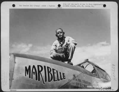 Consolidated > Lt. Colonel Bill Stratton Poses On The Nose Of His Lockheed P-38 Lightning 'Maribelle' At An Airfield Somewhere In Italy.