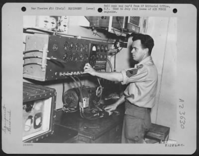 Thumbnail for Consolidated > This Master Electrical Test Panel, According To Personnel Of The 15Th Af In Italy Who Benefited From Its Installation, Could Do Anything Except Talk.  It Was Made By M/Sgt Earl L. Harris Of Baldwin Park, Calif., Shown Here Conducting A Test.