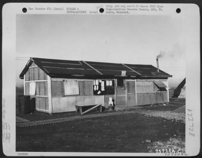 Thumbnail for Consolidated > Engineering Building Of The 94Th Fighter Squadron, 1St Fighter Group, Built From Bomb Crates At An Airfield Somewhere In Italy.