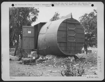 Thumbnail for Consolidated > Work Shop Built From Part Of A Douglas C-47 At Bari Airfield, Italy.  October 1944.