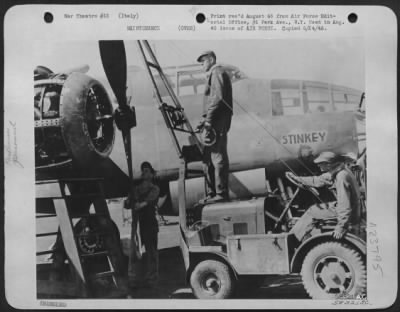 Consolidated > At An Air Depot Of The Aaf Service Command In Italy -- The Ground Crews Of The Aaf Also Require Team Work.  Left To Right, Pvt. Marshall Hufstetley, Son Of Mr. And Mrs. H. Hufstetley, Rancow Station, Gastonia, N.C.; Pfc. Delbert Mccullough, Son Of Mr. And