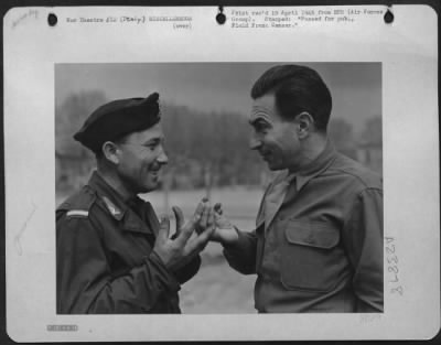 Thumbnail for Consolidated > Sgt. Eddie Cope Of Austin, Texas, Tries Out The Italian Sign Language On Gi Guiseppe.  Success!  Italy.