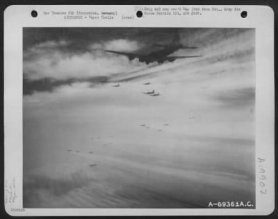 Thumbnail for Consolidated > Boeing B-17 Flying Fortresses Of The 91St Bomb Group Leave Trails Of Vapor Behind As They Wing Their Way Toward The Target - An Enemy Installation In Brunswick, Germany.  30 Jan 1944.