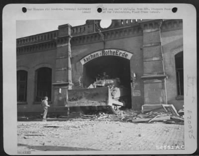 Consolidated > While 9th AF fighter-bombers were attacking strongpoints in the city of Aachen, Germany, preparatory to an assault by ground troops, the German defenders blew up a viaduct leading into the town. How the Americans circumvented the enemy demolition is