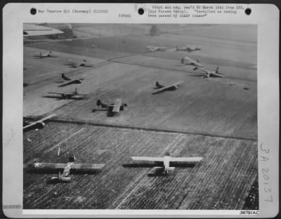 Thumbnail for Consolidated > GLIDERS DOT THE GERMAN LANDSCAPE--Allied gliders dot the German landscape behind the German front lines on the Rhine. Parachute troops were dropped, 24 March 1945 in advance of the Rhine-crossing ground troops by 1500 transports and