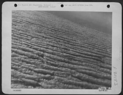 Consolidated > Flight of allied bombers over unusual cloud formations during the Magdeburg, Germany raid on 20 June 1944.