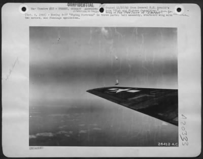 Thumbnail for Consolidated > (Oct. 8, 1943)-Boeing B-17 "Flying Fortress" in three parts; tail assembly, starboard wing with two motors, and fuselage upsidedown.