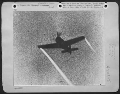 Consolidated > FW-190 with condensation trails at wing tips.-GERMANY