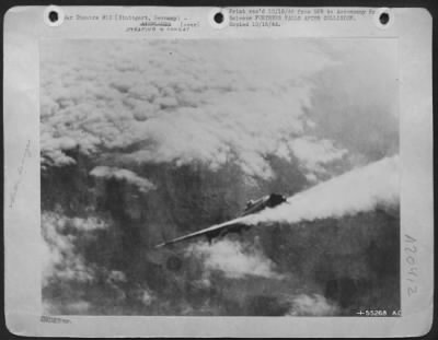 Thumbnail for Consolidated > The dangers of close formation flying sometime take their toll of U.S. Army 8th Air Force heavy bombers. This scene is the result of a collision when Boeing B-17 Flying Fortresses attacked Stuttgart, Germany. Photo shows the lead ship of one