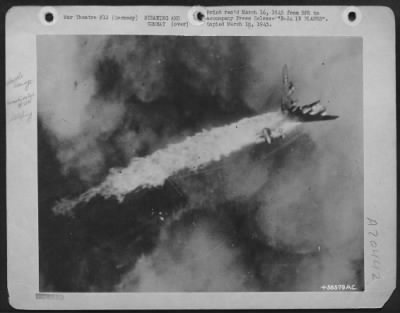 Thumbnail for Consolidated > B-24 IN FLAMES-A B-24 Liberator of the U.S. Army 8th Air Force's 2nd Air Division goes down in flames during an attack on the railway marshalling yards at Munster, Germany. The port wing is breaking off as the blazing fuel tanks leave a trail of fire