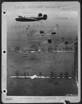 Consolidated > THE GREATEST AIRBORNE INVASION IN HISTORY.---From low level, B-24 Liberators of Major General William E. Kepner's Second Air Division of the U.S. Army 8th Air Force drop supplies by parachute to the airborne forces who had landed east of