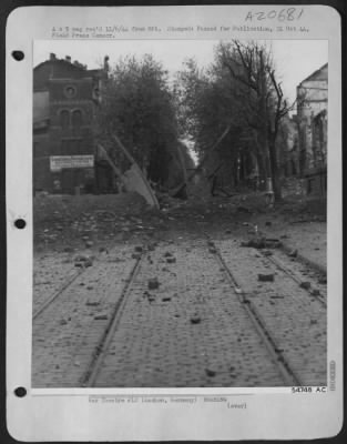 Consolidated > The end of the line for this set of street car tracks in South Aachen, Germany, the terminus resulting from hits by 9th Af fighter-bombers during the bombardment preceding the capitulation of the German garrison.