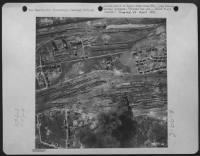 Thumbnail for 1St Lt. Edward R. Johnston, Reynolds Ill., North American P-51 Mustang Pilot From A Tact. Reconnaissance Group Took This Shot Of The Osterfeld Railroad Yard Containing Nearly 1000 Mixed Cars And Six Locomotives.  Explosion And Large Oil Fire Were Caused B - Page 1