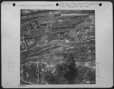 Thumbnail for Consolidated > 1St Lt. Edward R. Johnston, Reynolds Ill., North American P-51 Mustang Pilot From A Tact. Reconnaissance Group Took This Shot Of The Osterfeld Railroad Yard Containing Nearly 1000 Mixed Cars And Six Locomotives.  Explosion And Large Oil Fire Were Caused B