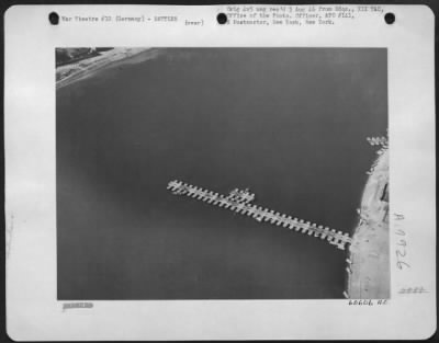 Thumbnail for Consolidated > Germany - 3Rd Army Engineers Assemble A Pontoon Bridge From The East Or Bridgehead Side Of The Rhine.  The 1St Tanks And Vehicles Were Ferried Across On Pontoon Sections Whcih Were Later Formed Into A Bridge.  The Operation Was Carried Out Under Continuou