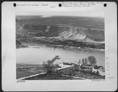 Thumbnail for Consolidated > Germany - 3Rd Army Engineers Assemble A Pontoon Bridge From The East Or Bridgehead Side Of The Rhine.  The 1St Tanks And Vehicles Were Ferried Across On Pontoon Sections Whcih Were Later Formed Into A Bridge.  The Operation Was Carried Out Under Continuou