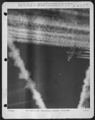 Thumbnail for Consolidated > Boeing B-17 Flying Fortresses Of The 452Nd Bomb Group Leaves Another Lane Of Vapor Trails To Those Left By Preceding Formation Enroute To Regensburg, Germany 25 Feb. 1944.  Taken By S/Sgt. F. Ferreri.