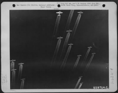 Thumbnail for Consolidated > Boeing B-17 Flying Fortresses Of The 381St Bomb Group Leave Their Spider-Like Trails In The Sky As They Drone Steadily On Toward Berlin, Germany On 22 March 1944 To Strike Again At Nazi Installations.